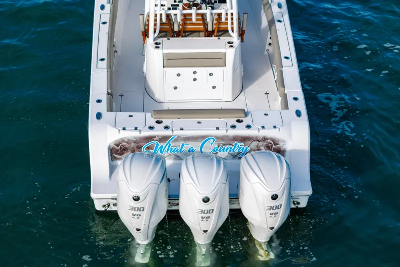 What A County Yacht Photos Pics 2022 Sportsman Open 352 Center Console boat with triple 300 HP engines on water.