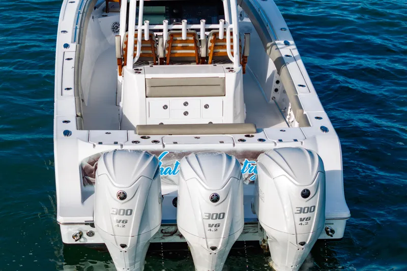 What A County Yacht Photos Pics 2022 Sportsman Open 352 Center Console boat with triple 300 V6 engines on water.