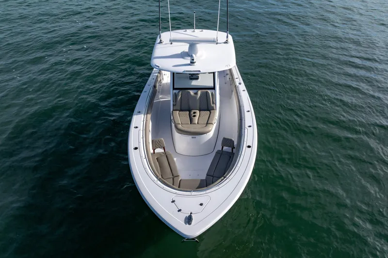 What A County Yacht Photos Pics 2022 Sportsman Open 352 Center Console boat on calm water, aerial view.
