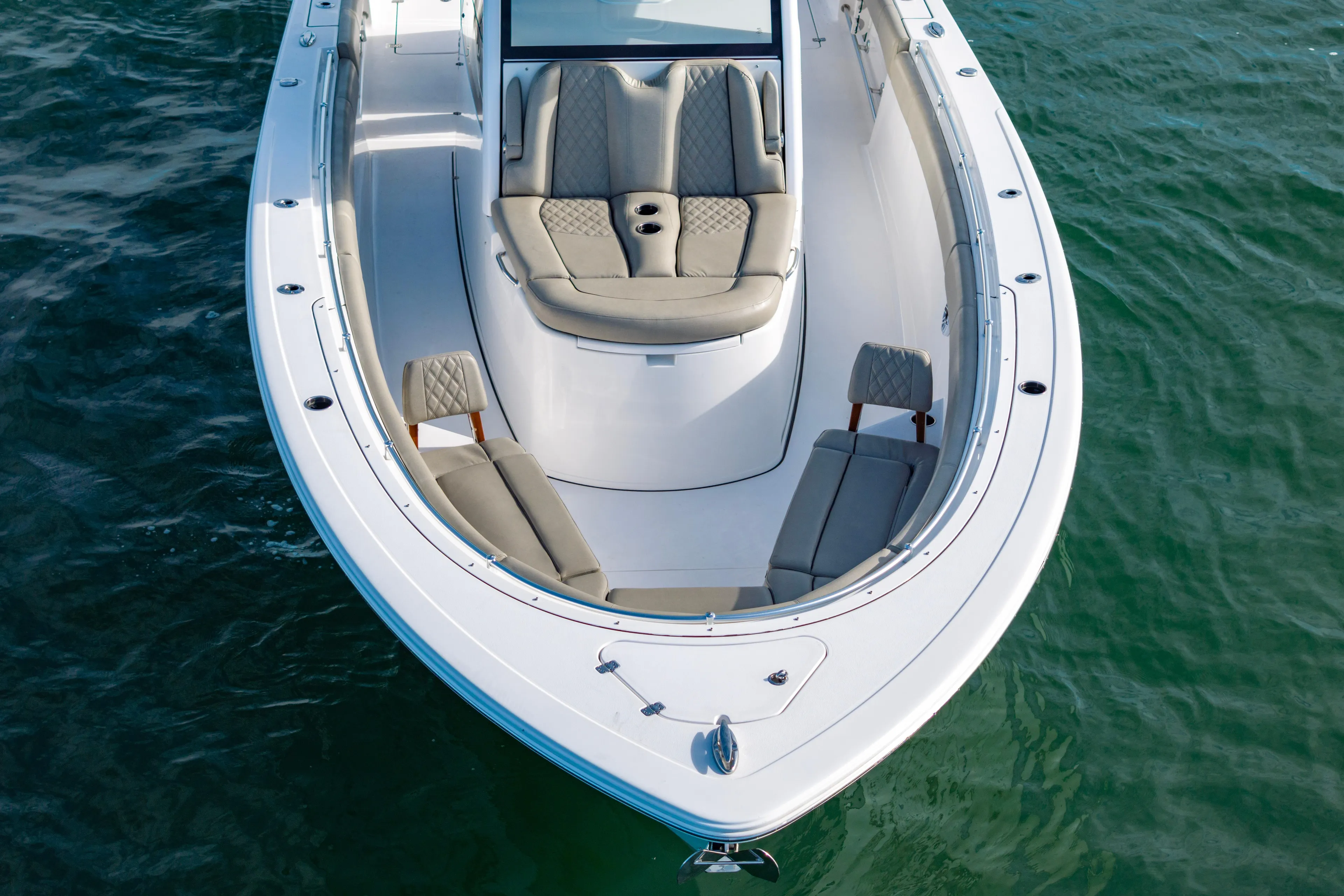 What A County Yacht Photos Pics 2022 Sportsman Open 352 Center Console boat with luxurious seating on calm water.