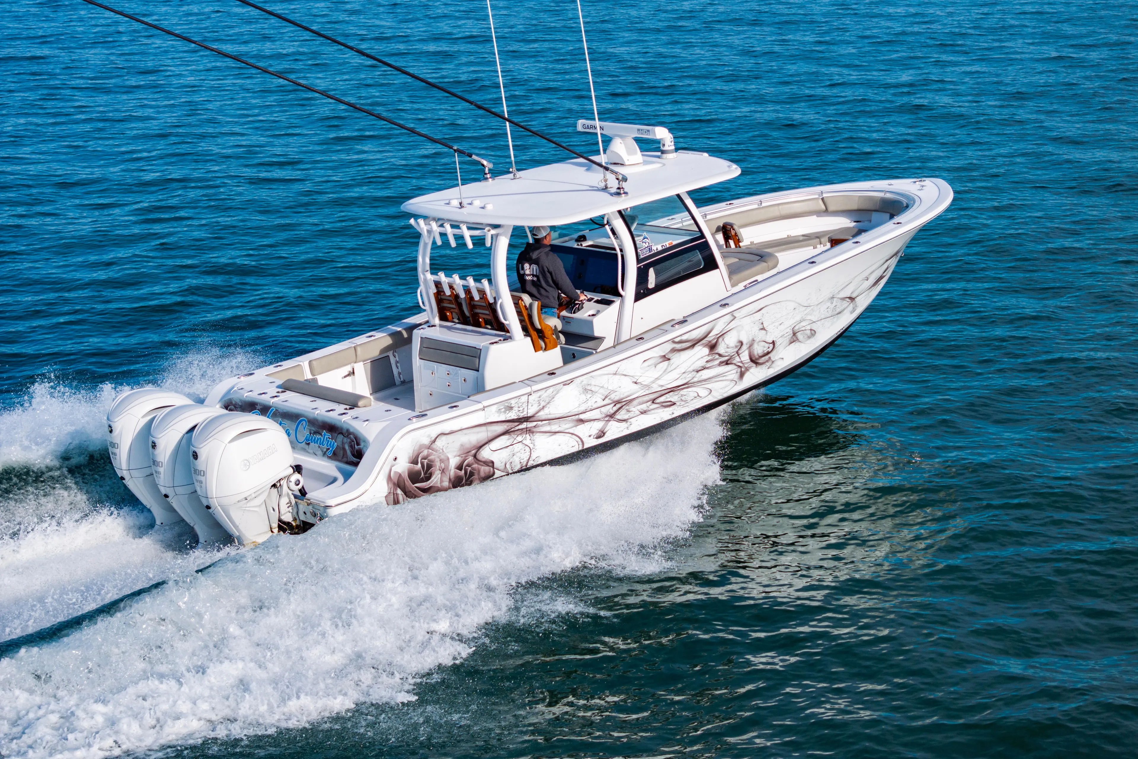 What A County Yacht Photos Pics 2022 Sportsman Open 352 Center Console boat cruising on open water.