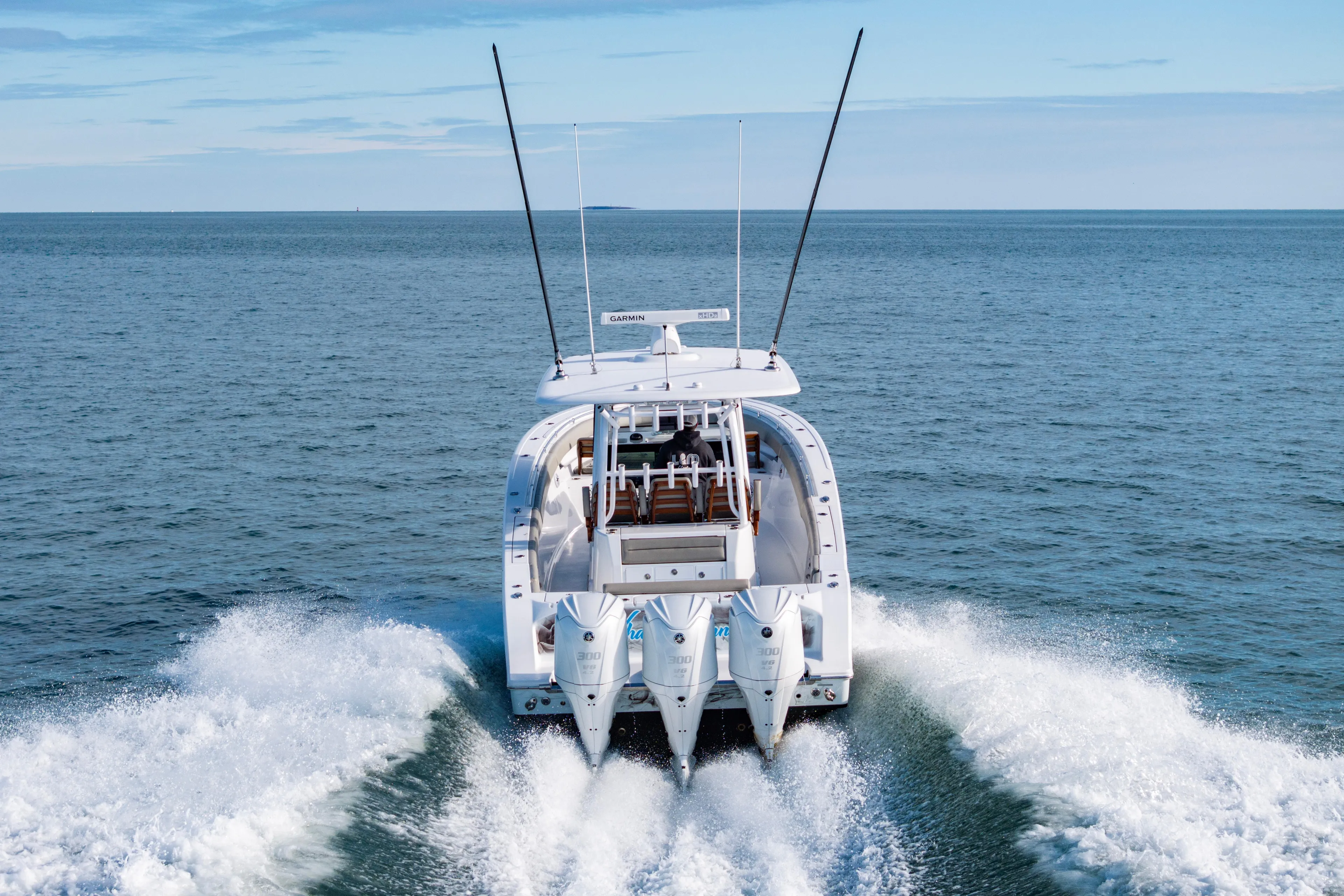 What A County Yacht Photos Pics 2022 Sportsman Open 352 Center Console boat cruising on open water.