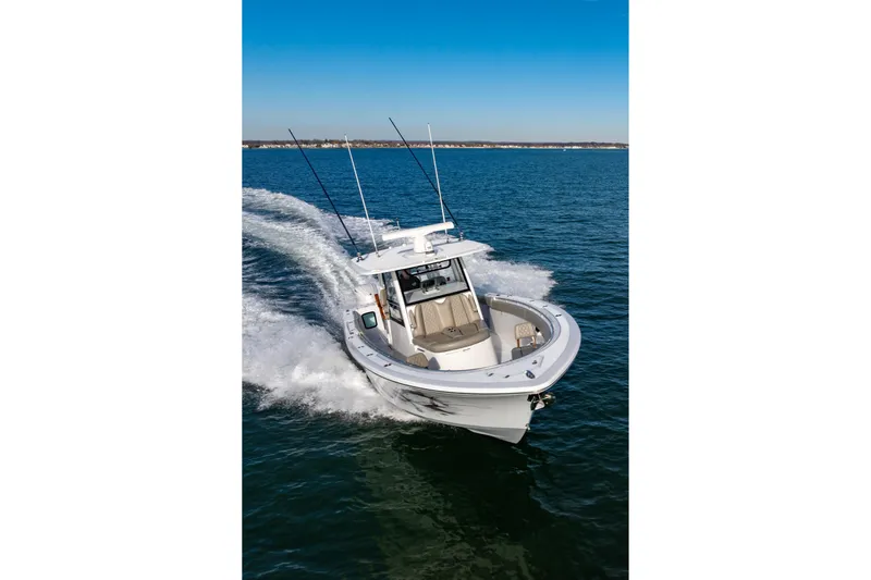 What A County Yacht Photos Pics 2022 Sportsman Open 352 Center Console boat cruising on open water.