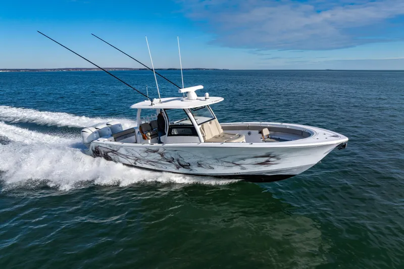 What A County Yacht Photos Pics 2022 Sportsman Open 352 Center Console boat cruising on open water.
