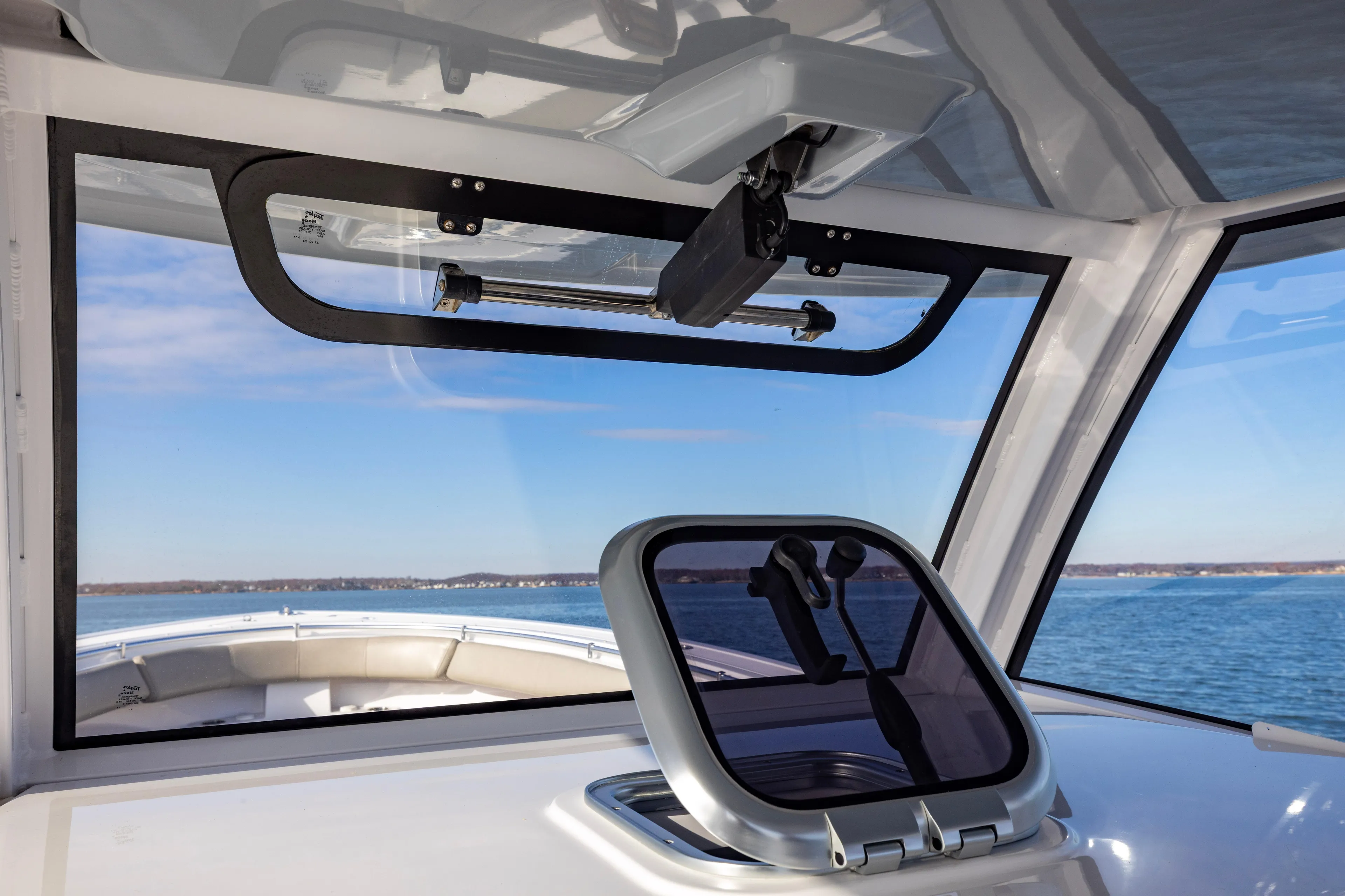 What A County Yacht Photos Pics 2022 Sportsman Open 352 Center Console boat interior with ocean view through windshield.