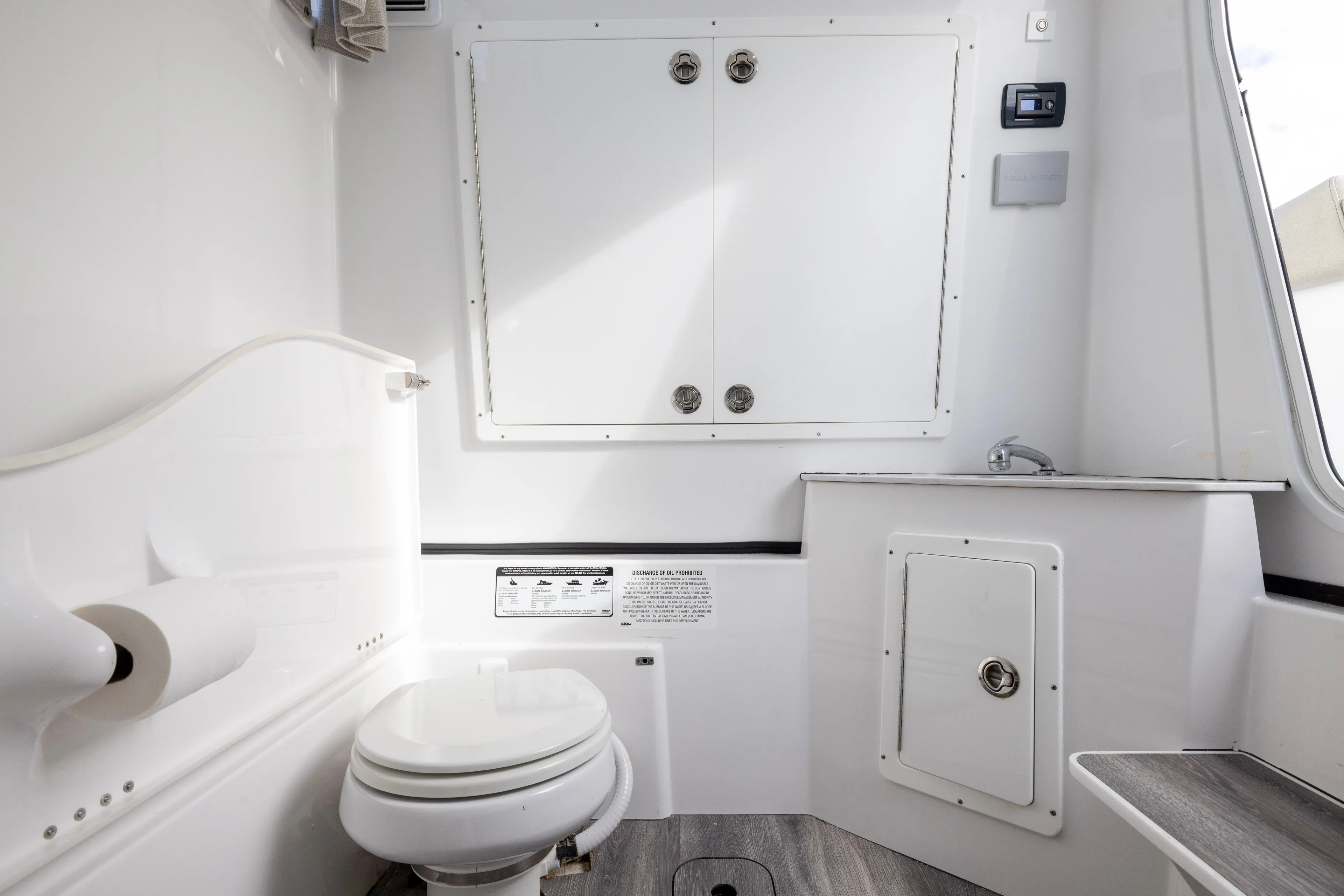 What A County Yacht Photos Pics 2022 Sportsman Open 352 Center Console interior with toilet and sink.