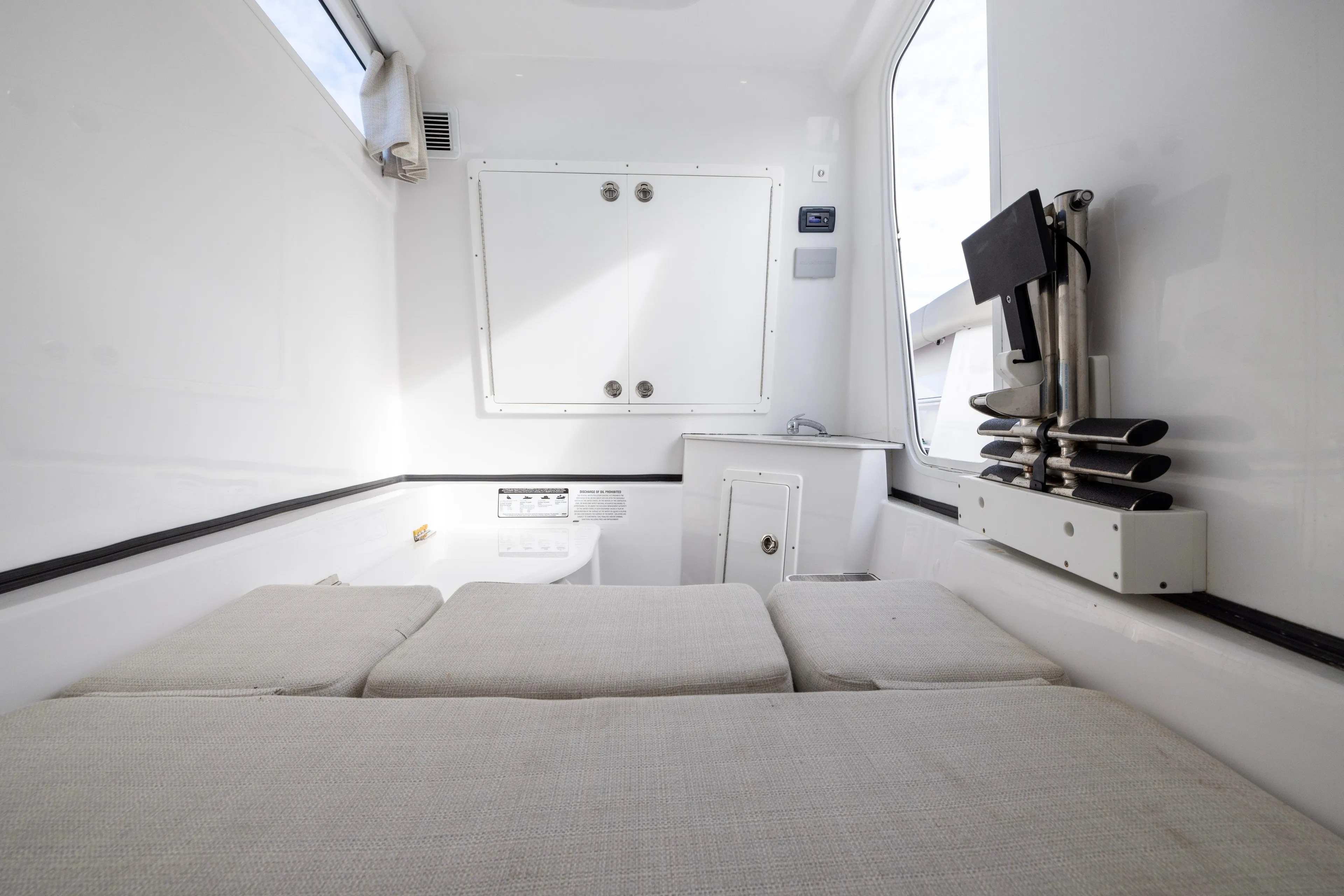 What A County Yacht Photos Pics 2022 Sportsman Open 352 Center Console interior with cushioned seating and storage compartments.