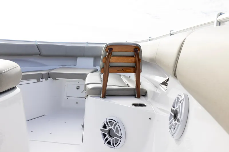 What A County Yacht Photos Pics 2022 Sportsman Open 352 Center Console boat interior with cushioned seating and speakers.