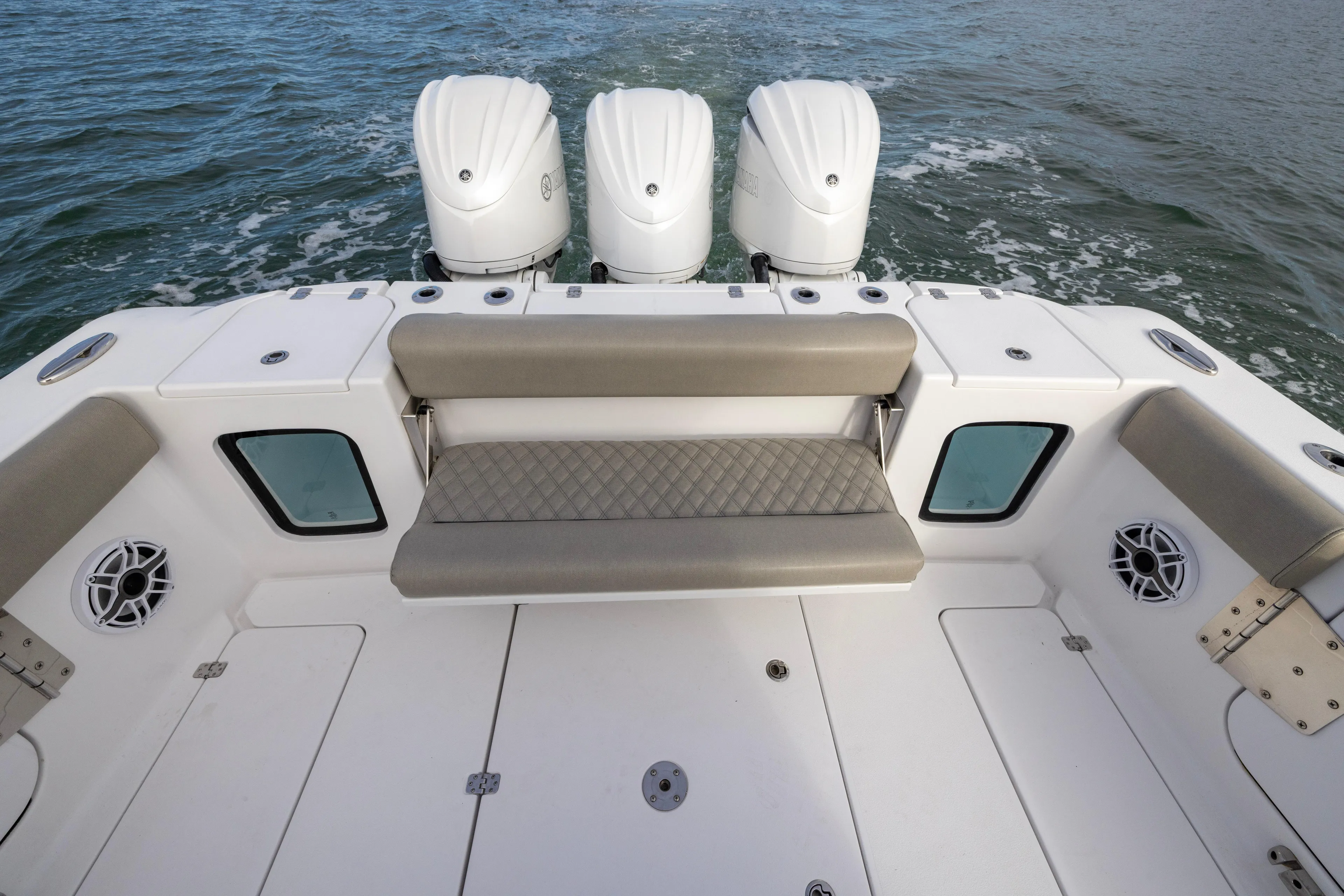 What A County Yacht Photos Pics 2022 Sportsman Open 352 Center Console boat with triple engines and cushioned seating.