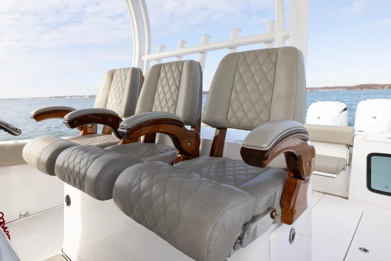 What A County Yacht Photos Pics Luxurious seating on 2022 Sportsman Open 352 Center Console boat, featuring elegant design.