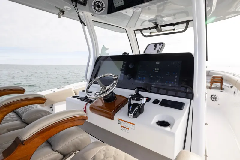 What A County Yacht Photos Pics 2022 Sportsman Open 352 Center Console boat interior with modern dashboard and steering wheel.