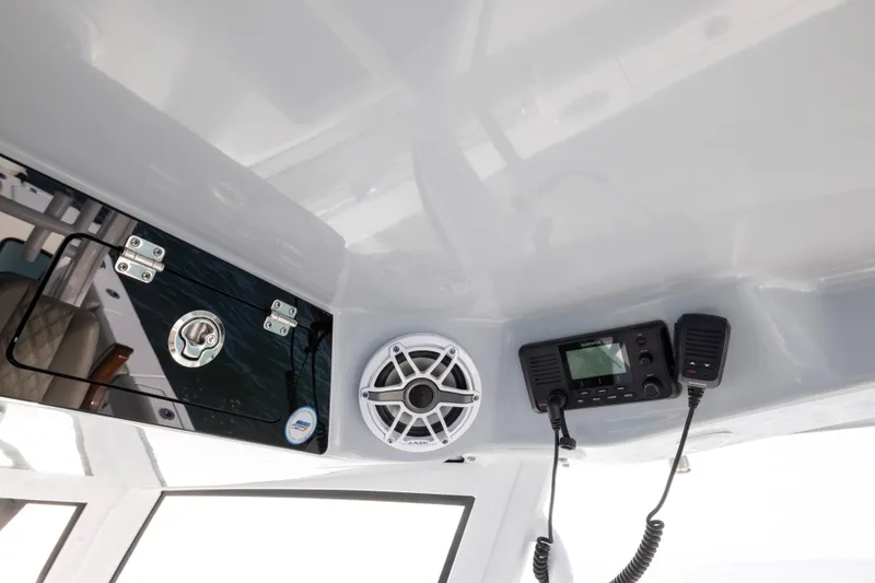 What A County Yacht Photos Pics 2022 Sportsman Open 352 Center Console interior with speaker and radio equipment.
