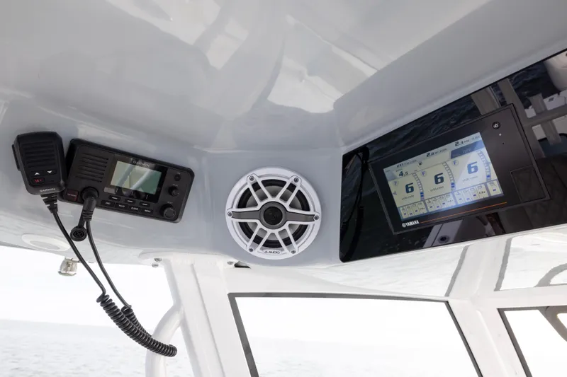 What A County Yacht Photos Pics 2022 Sportsman Open 352 Center Console dashboard with Garmin radio and Yamaha display.