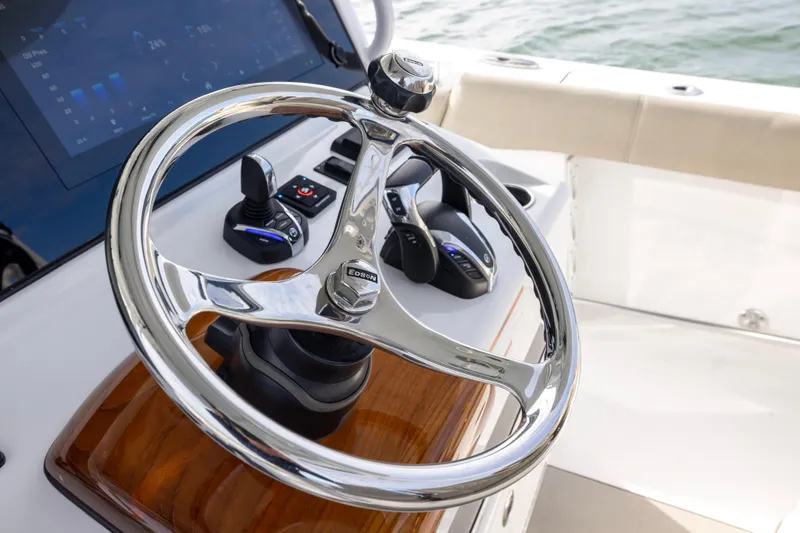 What A County Yacht Photos Pics 2022 Sportsman Open 352 Center Console steering wheel and controls, featuring modern design.