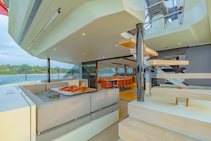 Jack Yacht Photos Pics Luxurious 2023 McConaghy MC75 yacht interior with modern seating and dining area.