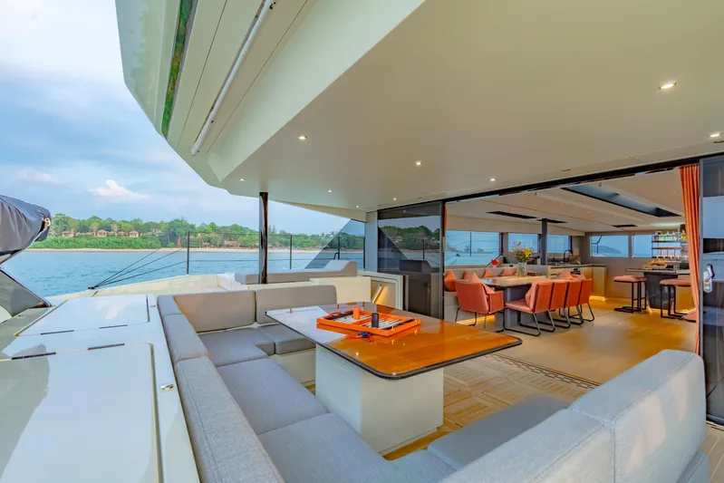 Jack Yacht Photos Pics Luxurious 2023 McConaghy MC75 yacht interior with elegant seating and dining area.