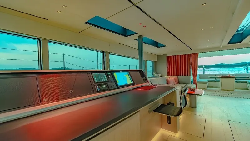 Jack Yacht Photos Pics Luxurious interior of 2023 McConaghy MC75 yacht with modern navigation station and panoramic windows.