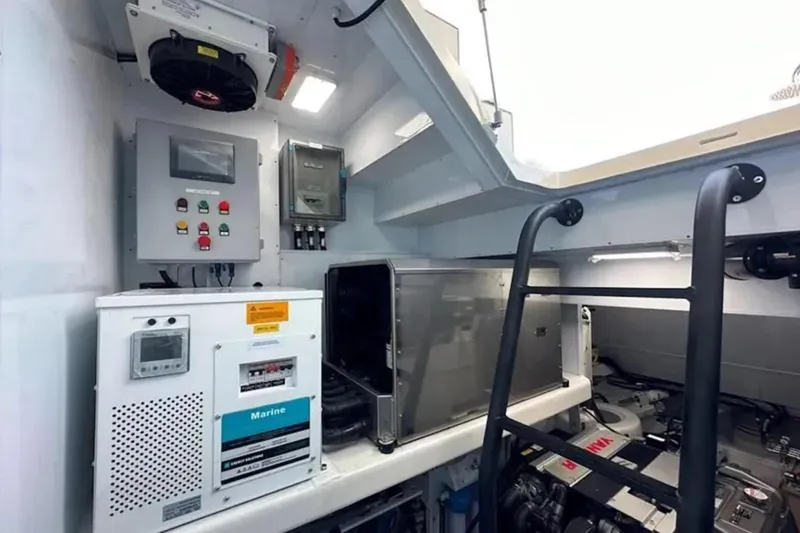 Jack Yacht Photos Pics Engine room of 2023 McConaghy MC75 yacht with control panels and equipment.