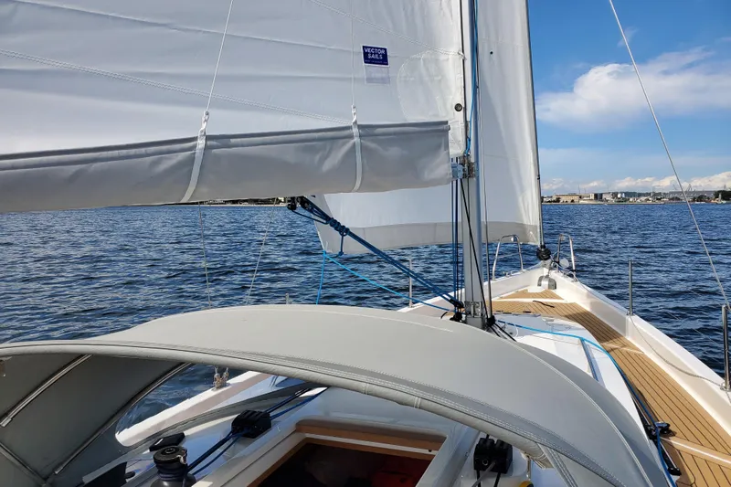  Yacht Photos Pics 2023 Viko Yachts S35 sailing on open water under clear blue skies.