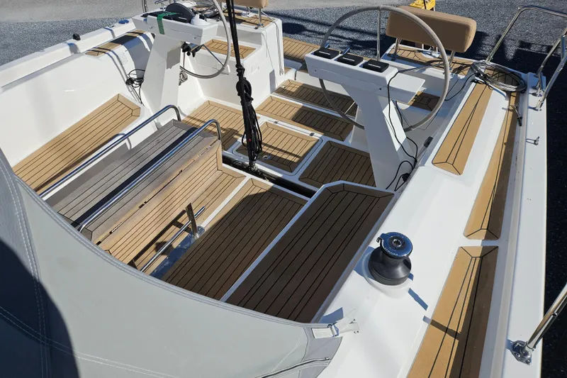  Yacht Photos Pics 2023 Viko Yachts S35 cockpit with teak flooring and modern steering wheel.