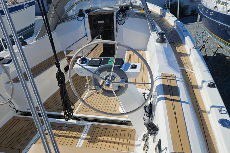  Yacht Photos Pics 2023 Viko Yachts S35 sailboat cockpit with modern steering wheel and teak decking.