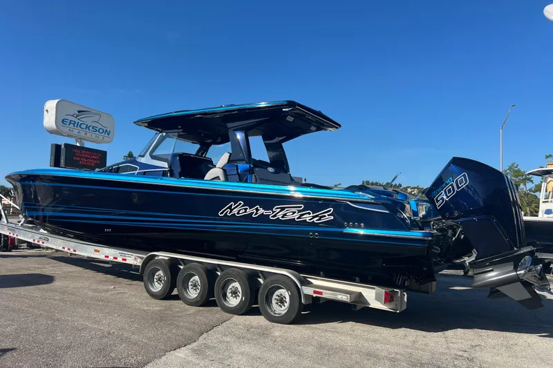  Yacht Photos Pics 2026 Nor-Tech 450 Sport boat on trailer at Erickson Marine dealership.