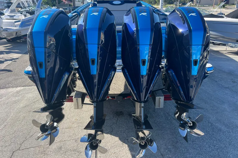  Yacht Photos Pics Four powerful outboard motors on a 2026 Nor-Tech 450 Sport boat.