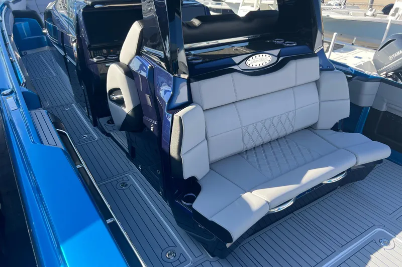  Yacht Photos Pics 2026 Nor-Tech 450 Sport boat interior with luxurious seating and sleek design.