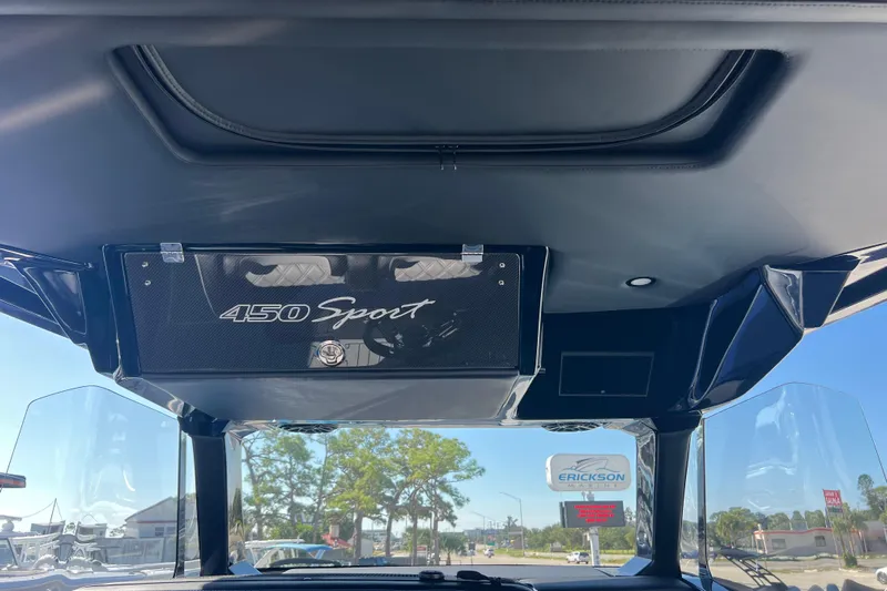  Yacht Photos Pics 2026 Nor-Tech 450 Sport boat interior, featuring sleek design and modern dashboard.