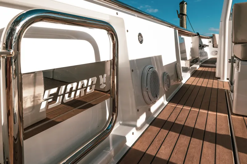 Next Yacht Photos Pics 2022 Fjord 38 Open yacht deck with sleek design and modern features.