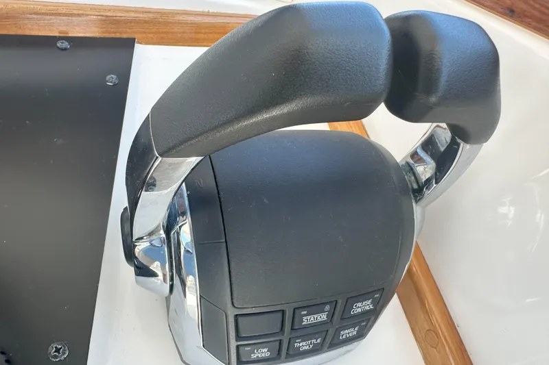 At Last 10 Yacht Photos Pics Throttle control of 2017 Fortier F-30 Hardtop boat, featuring cruise control and speed settings.