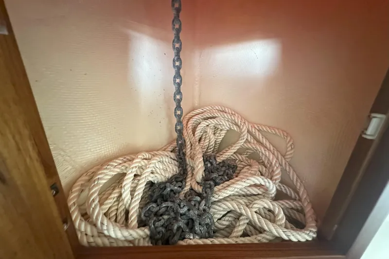 At Last 10 Yacht Photos Pics Rope and chain storage inside 2017 Fortier F-30 Hardtop boat compartment.