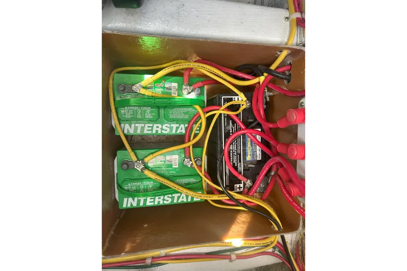 At Last 10 Yacht Photos Pics Battery compartment of 2017 Fortier F-30 Hardtop with Interstate batteries and wiring.