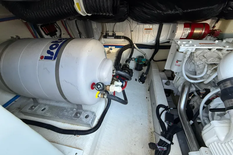 Never Say Never Again Yacht Photos Pics Engine room of 2019 Back Cove Downeast 37 with Isotemp water heater and mechanical components.