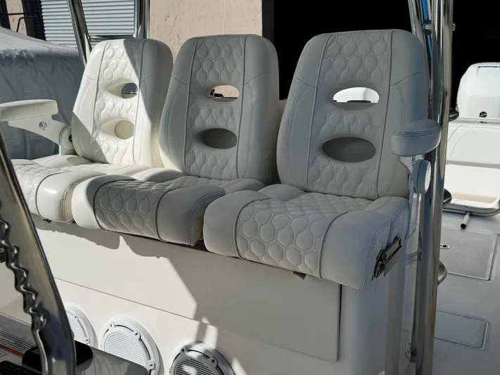  Yacht Photos Pics 2023 Contender 39 ST boat interior with luxurious white seating.