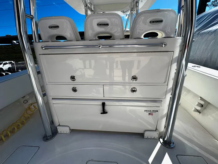  Yacht Photos Pics 2023 Contender 39 ST boat interior with storage drawers and seating.