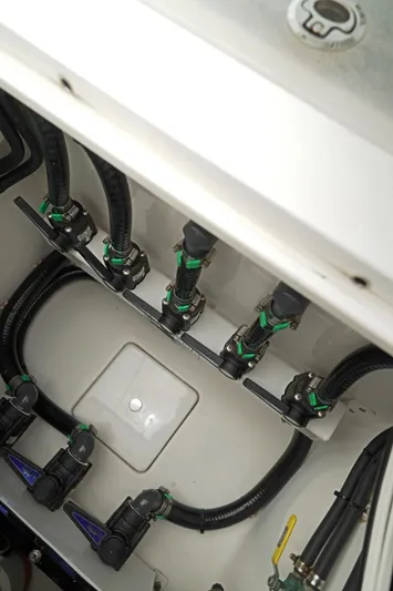  Yacht Photos Pics 2023 Contender 39 ST boat plumbing system with hoses and valves.