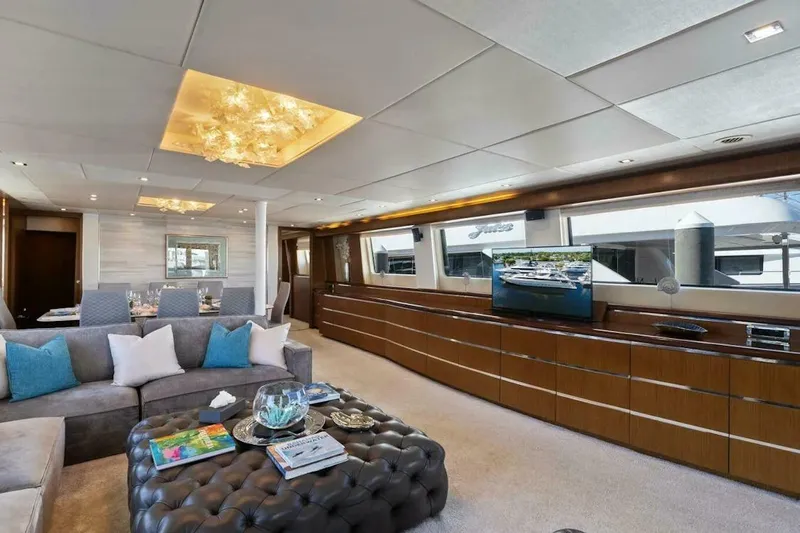  Yacht Photos Pics Luxurious interior of 2006 Tecnomar 35 Nadara yacht with elegant seating and modern decor.