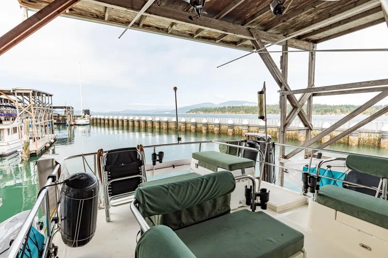 Greymalkin II Yacht Photos Pics 2008 North Pacific 39 Pilothouse yacht docked at marina with scenic water view.