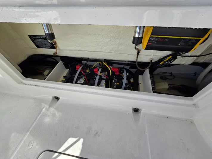 No Regrets Yacht Photos Pics Battery compartment of 2022 Robalo R272 Center Console boat.