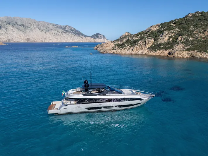 Filippetti F100 Yacht Photos Pics Luxury Filippetti F100 yacht cruising in clear blue waters, 2026 model.