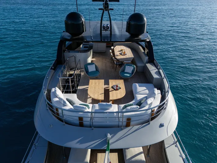 Filippetti F100 Yacht Photos Pics Luxurious 2026 Filippetti F100 yacht with spacious deck and elegant seating on blue ocean.