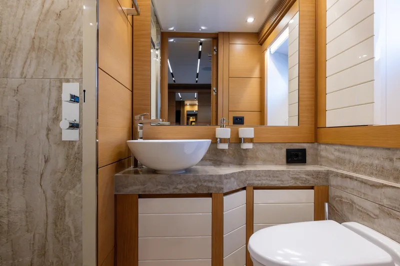 Filippetti F100 Yacht Photos Pics Luxurious bathroom in 2026 Filippetti F100 yacht with modern fixtures and elegant design.