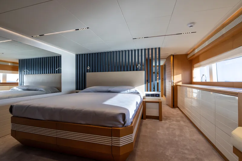 Filippetti F100 Yacht Photos Pics Luxurious bedroom interior of 2026 Filippetti F100 yacht with modern design and ample natural light.