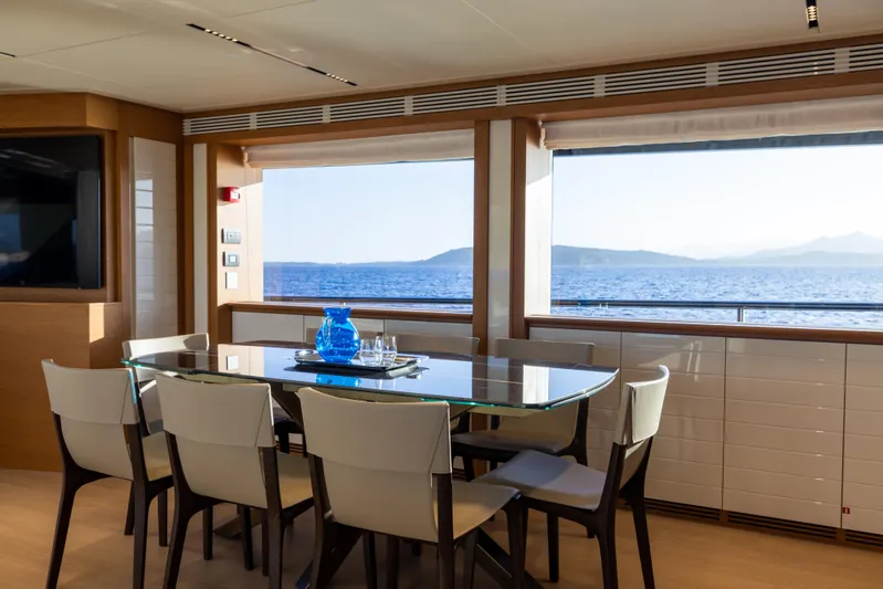 Filippetti F100 Yacht Photos Pics Luxurious dining area on 2026 Filippetti F100 yacht with ocean view.