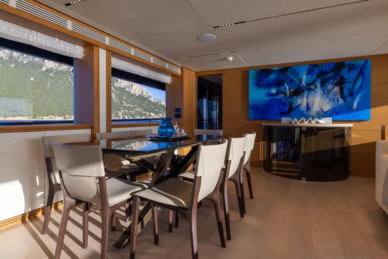 Filippetti F100 Yacht Photos Pics Luxurious dining area on 2026 Filippetti F100 yacht with modern decor and scenic views.
