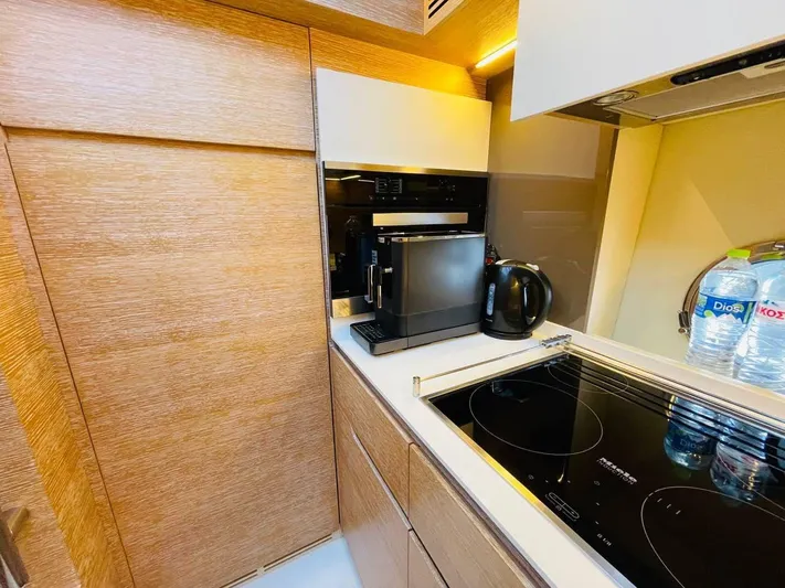 Vika Yacht Photos Pics Modern kitchen in 2016 Azimut Fly 50 yacht with appliances and sleek design.