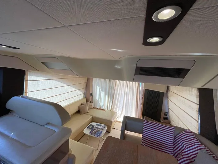 Vika Yacht Photos Pics Luxurious interior of 2016 Azimut Fly 50 yacht with modern seating and ambient lighting.