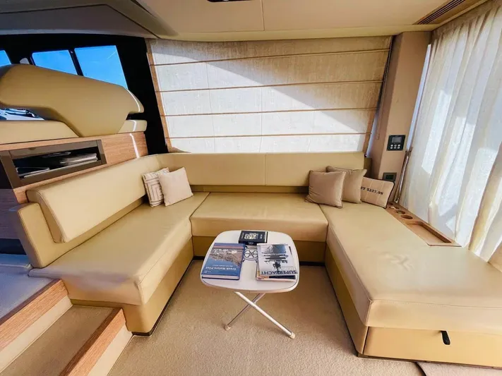 Vika Yacht Photos Pics Luxurious interior of 2016 Azimut Fly 50 yacht with beige seating and modern decor.