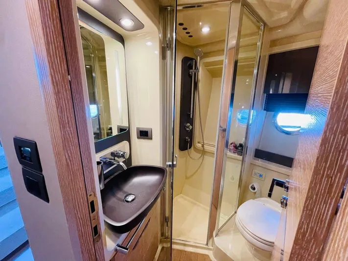 Vika Yacht Photos Pics Luxurious bathroom in 2016 Azimut Fly 50 yacht with modern fixtures and elegant design.